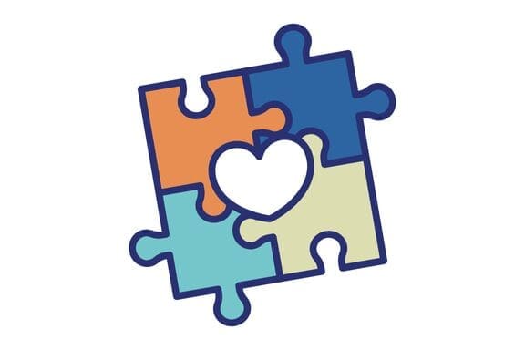 Puzzle pieces with heart shape in center.